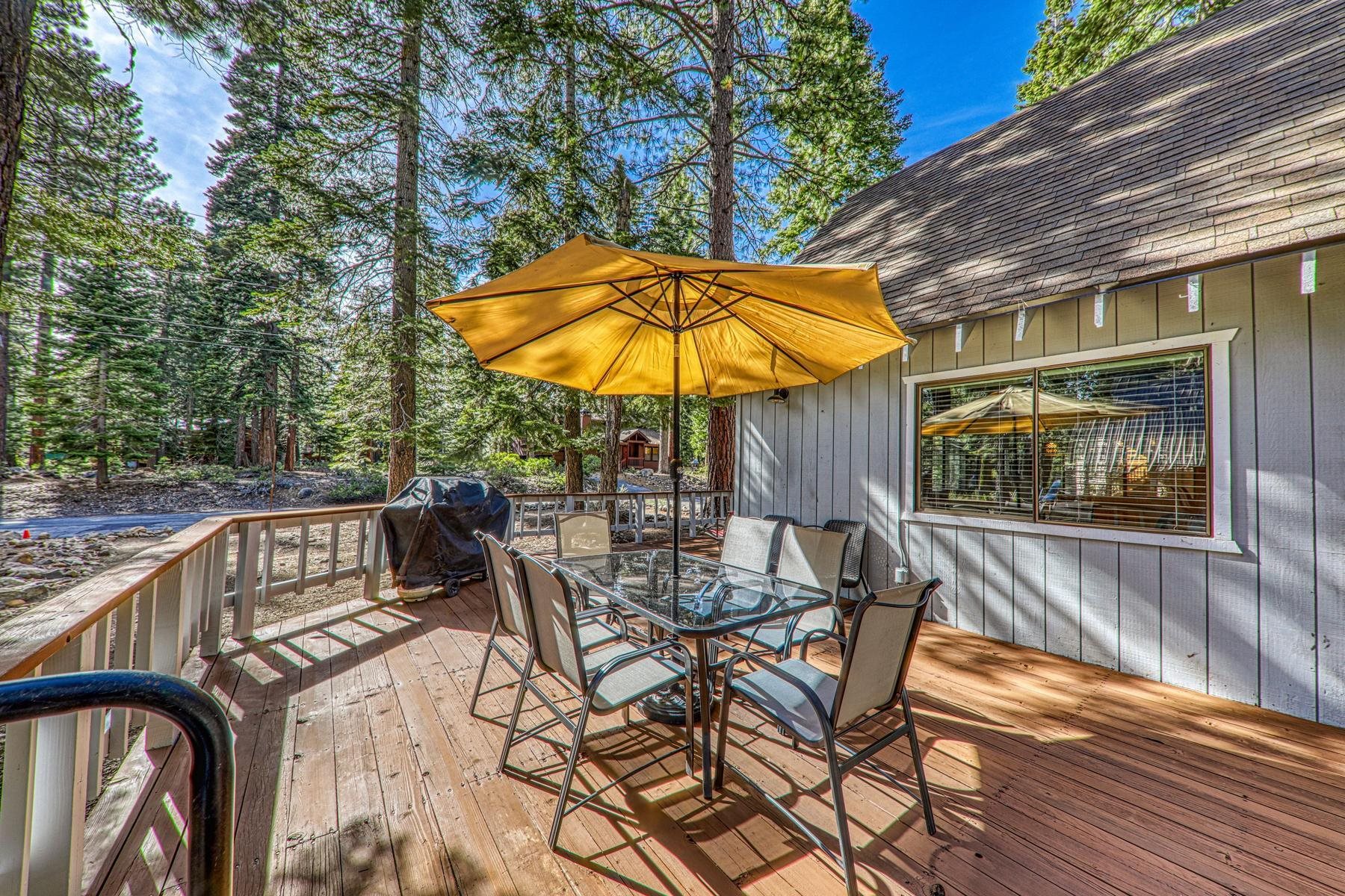 5656 Victoria Road Carnelian Bay, CA 96140 - Photo 25 of 28 a view of balcony with wooden floor and outdoor seating