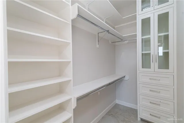 a view of an empty walk in closet