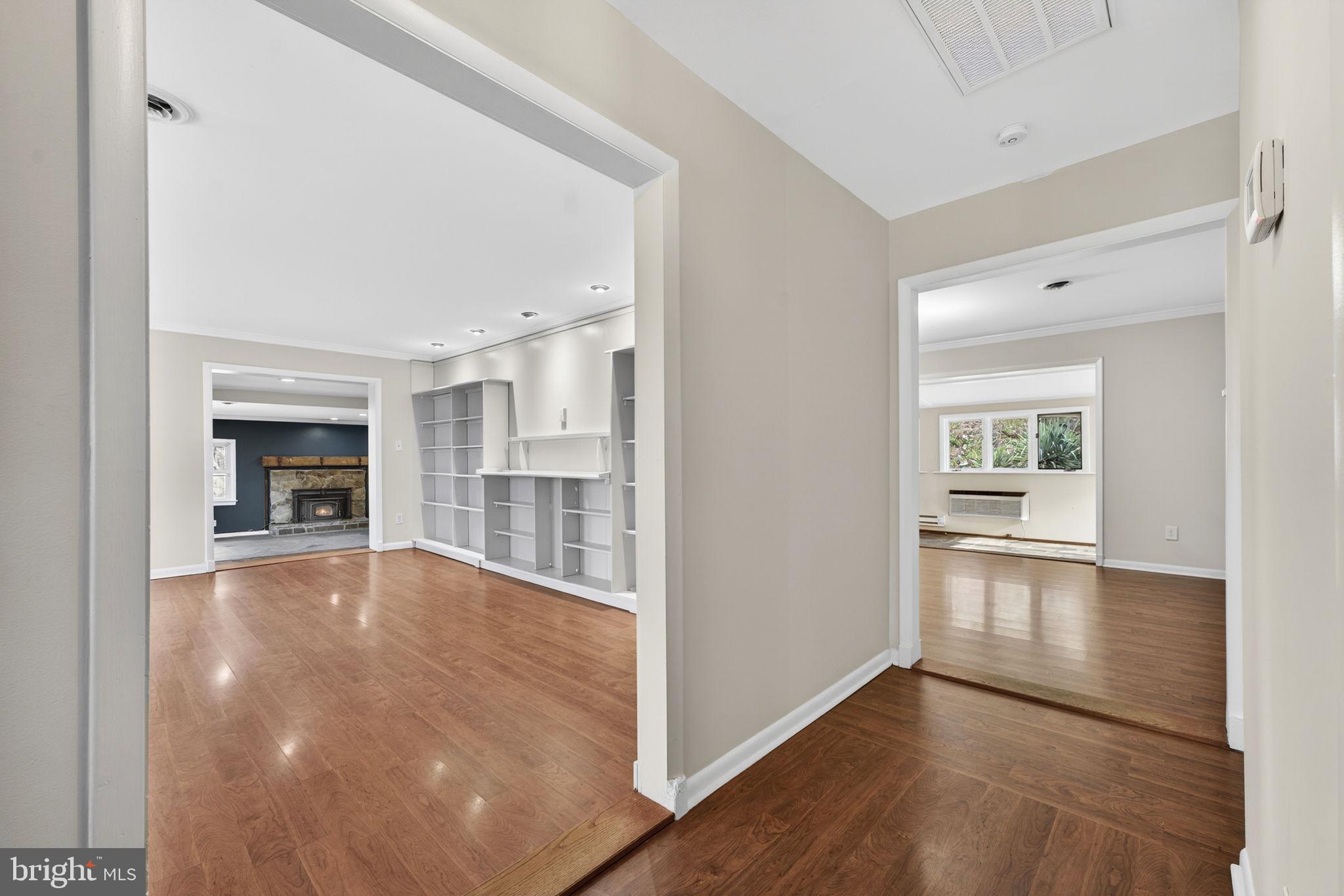 4119 Bull Run Mountain Road The Plains, VA 20198 - Photo 15 of 98 a view of empty room with wooden floor and fireplace
