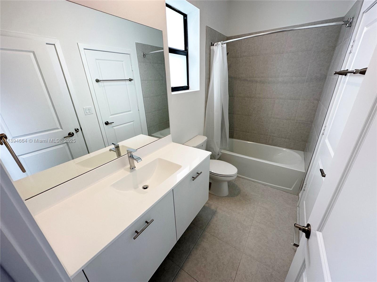 17394 Southwest 46th Street Miramar, FL 33029 - Photo 15 of 21 a bathroom with a double vanity sink toilet and shower