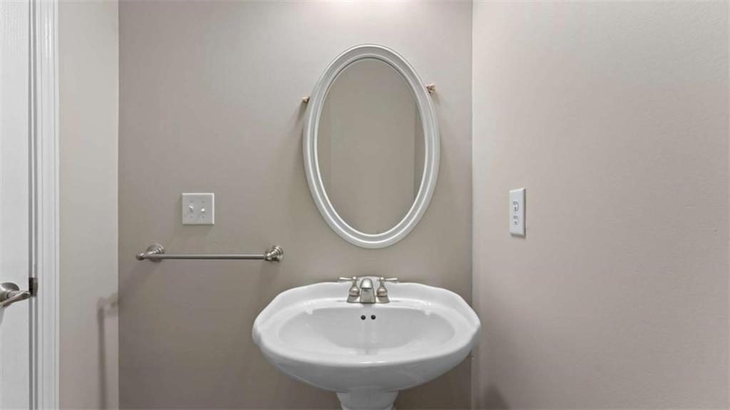 2620 Ridge Run Trail Duluth, GA 30097 - Photo 15 of 34 a bathroom with a sink and a mirror