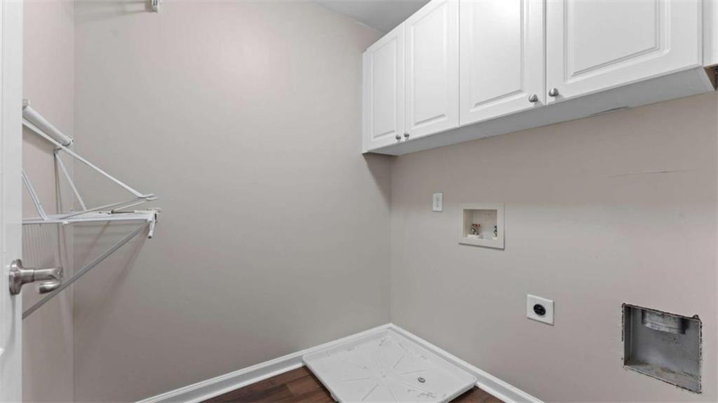2620 Ridge Run Trail Duluth, GA 30097 - Photo 27 of 34 a bathroom with a sink and cabinets
