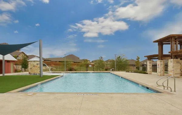 a view of a house with a swimming pool
