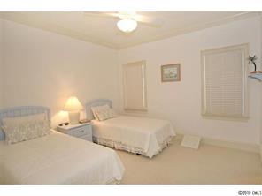 15 Catawba Ridge Road Lake Wylie, SC 29710 - Photo 12 of 16 a bedroom with two beds and a lamp
