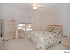 15 Catawba Ridge Road Lake Wylie, SC 29710 - Photo 13 of 16 a bedroom with a bed and window