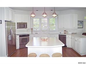 15 Catawba Ridge Road Lake Wylie, SC 29710 - Photo 5 of 16 a kitchen with kitchen island a stove a sink and a refrigerator