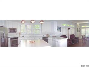 15 Catawba Ridge Road Lake Wylie, SC 29710 - Photo 6 of 16 a kitchen with stainless steel appliances granite countertop a sink and cabinets