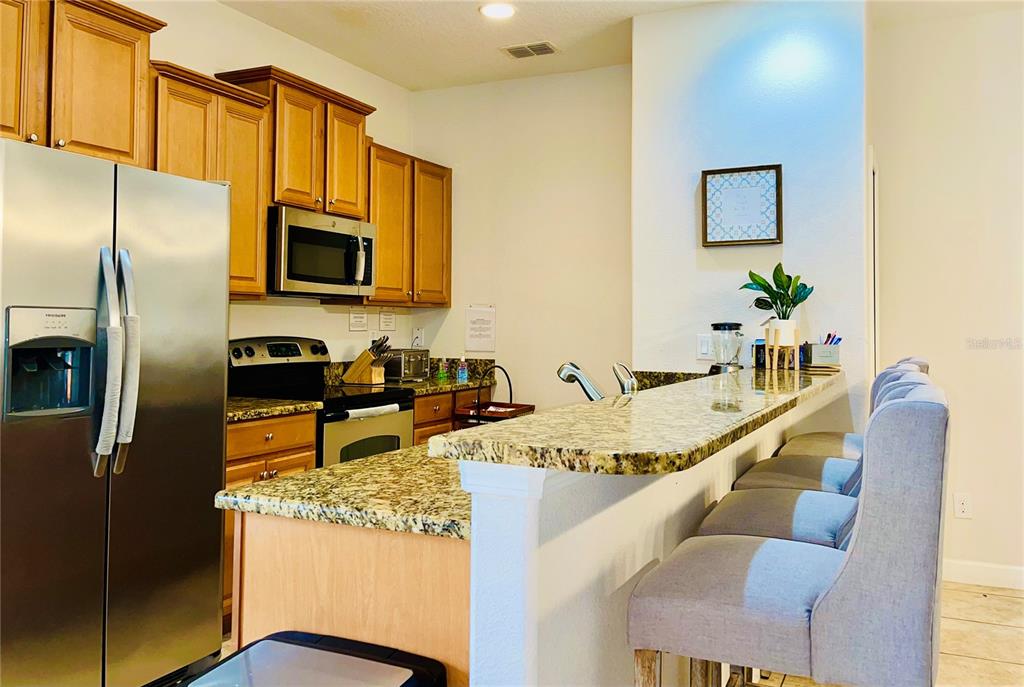 8964 Cat Palm Road Kissimmee, FL 34747 - Photo 6 of 47 Gallery Image 6