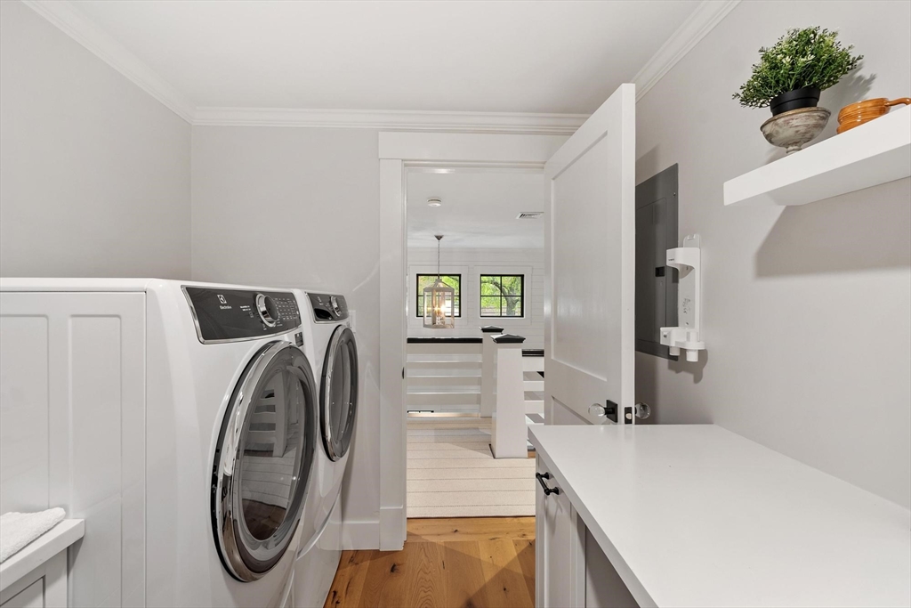 653 Main Street Concord, MA 01742 - Photo 35 of 42 a utility room with dryer and washer