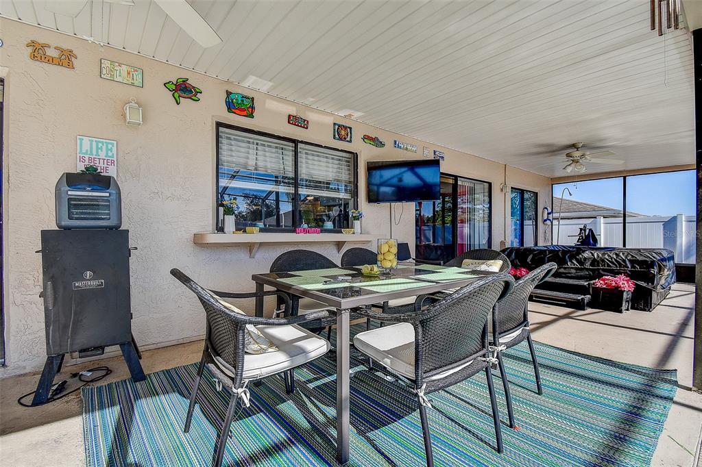 10440 Laval Street Spring Hill, FL 34608 - Photo 13 of 44 a living room with furniture and a table