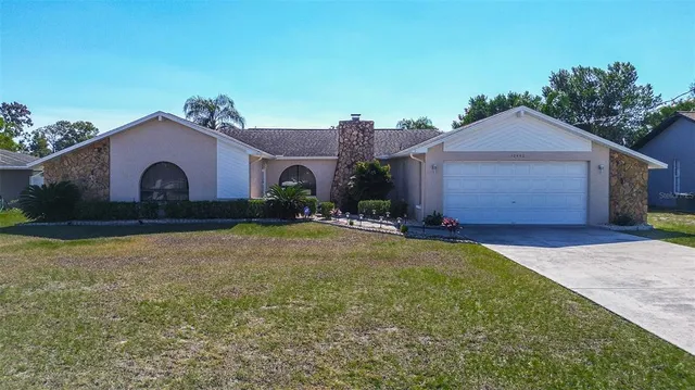 a house view with a garden space