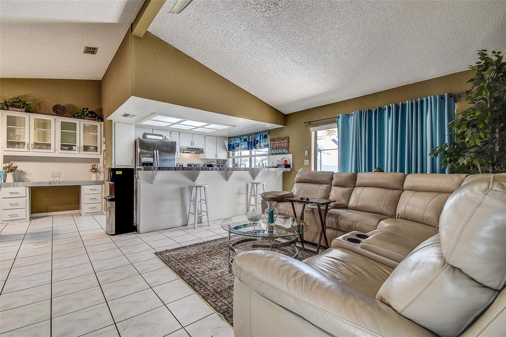 10440 Laval Street Spring Hill, FL 34608 - Photo 26 of 44 a living room with furniture and a fireplace