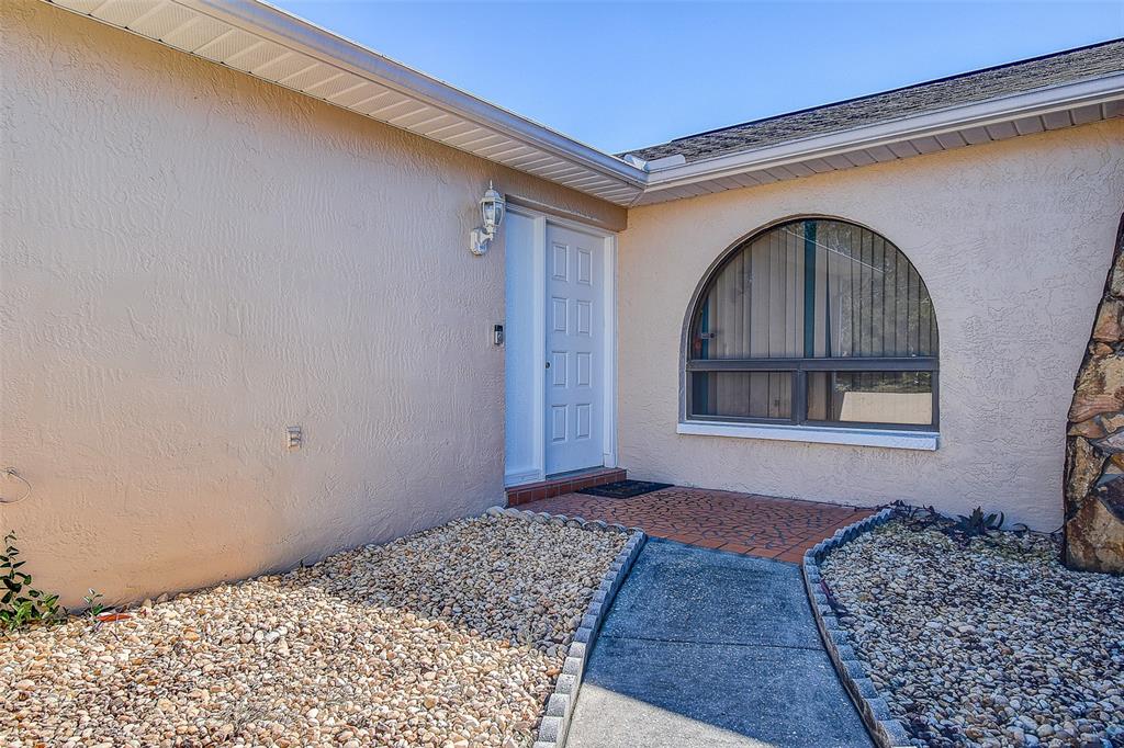 10440 Laval Street Spring Hill, FL 34608 - Photo 3 of 44 a front view of a house