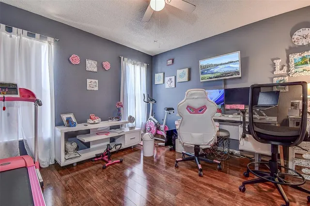 a bedroom with furniture and a bed
