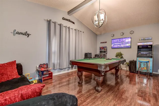 a room with furniture and wooden floor