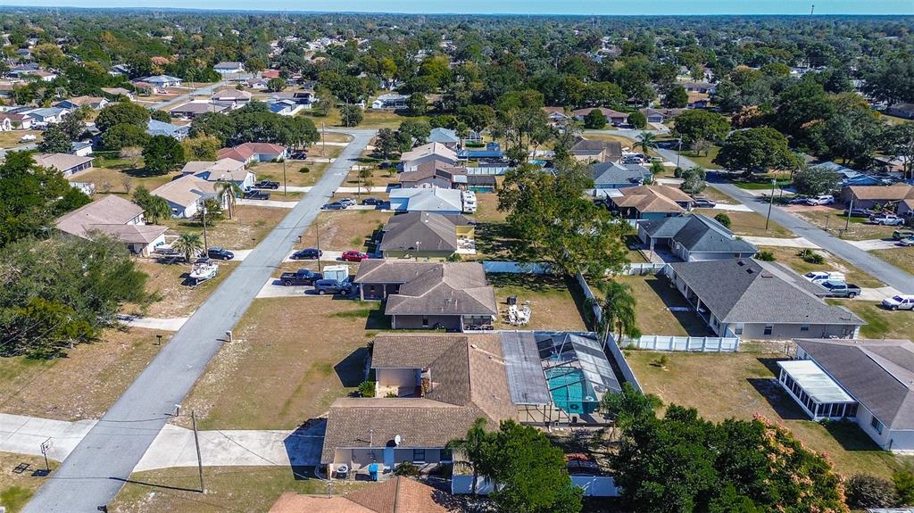 10440 Laval Street Spring Hill, FL 34608 - Photo 7 of 44 an aerial view of a city with lots of residential buildings