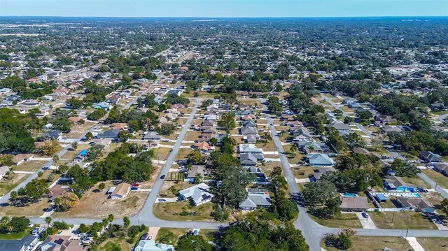 an aerial view of a city with lots of residential buildings