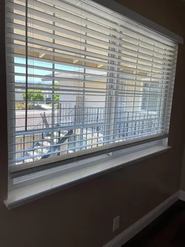 a view of a room that has a window in it