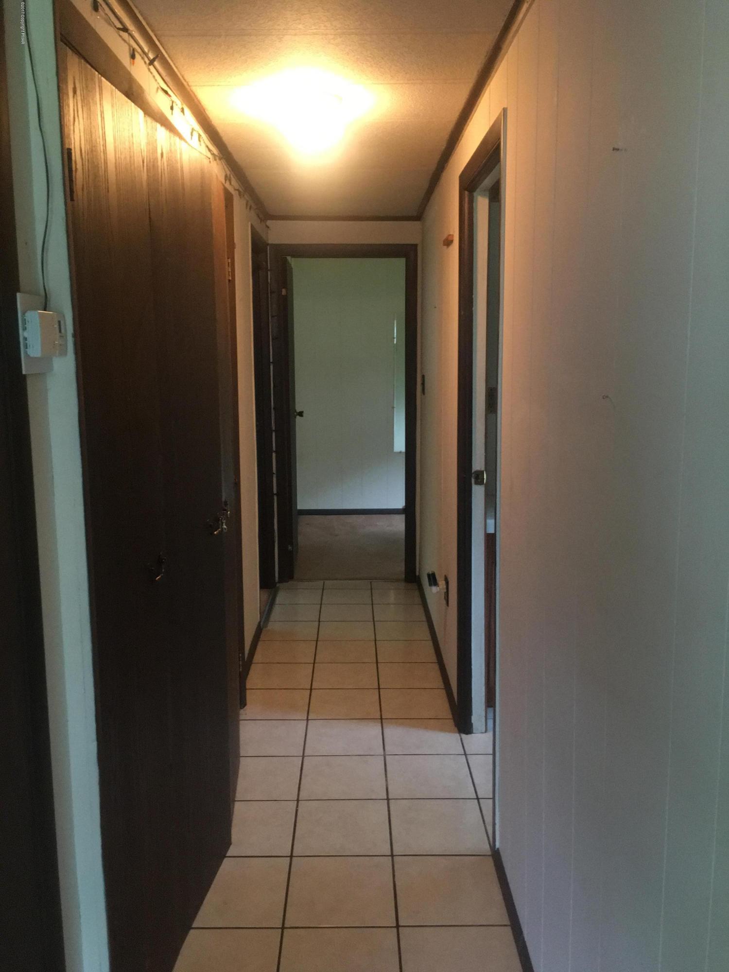 139 Gap View Circle Bushkill, PA 18324 - Photo 8 of 21 HALL WAY TO BATHE ROOM AND BEDROOM