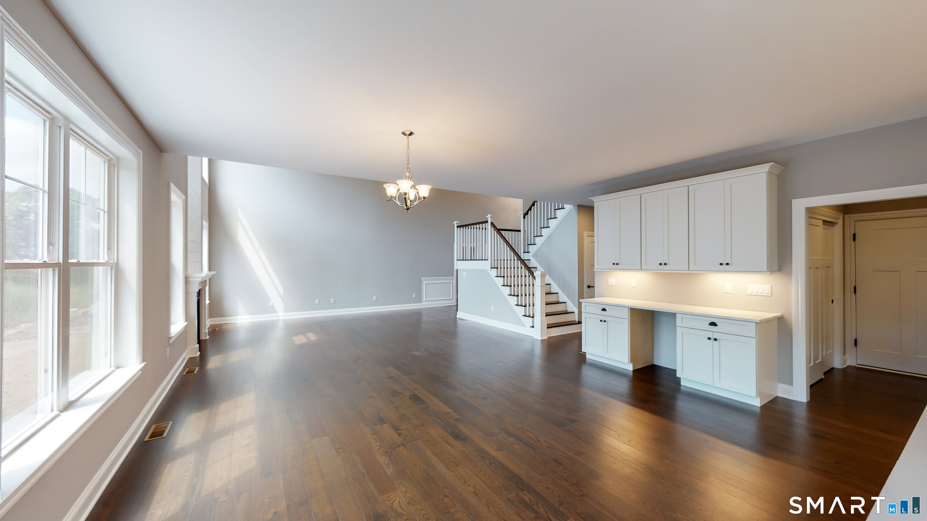 18 Twin Valley Road East Lyme, CT 06333 - Photo 13 of 26 wooden floor in an empty room with a window and wooden floor