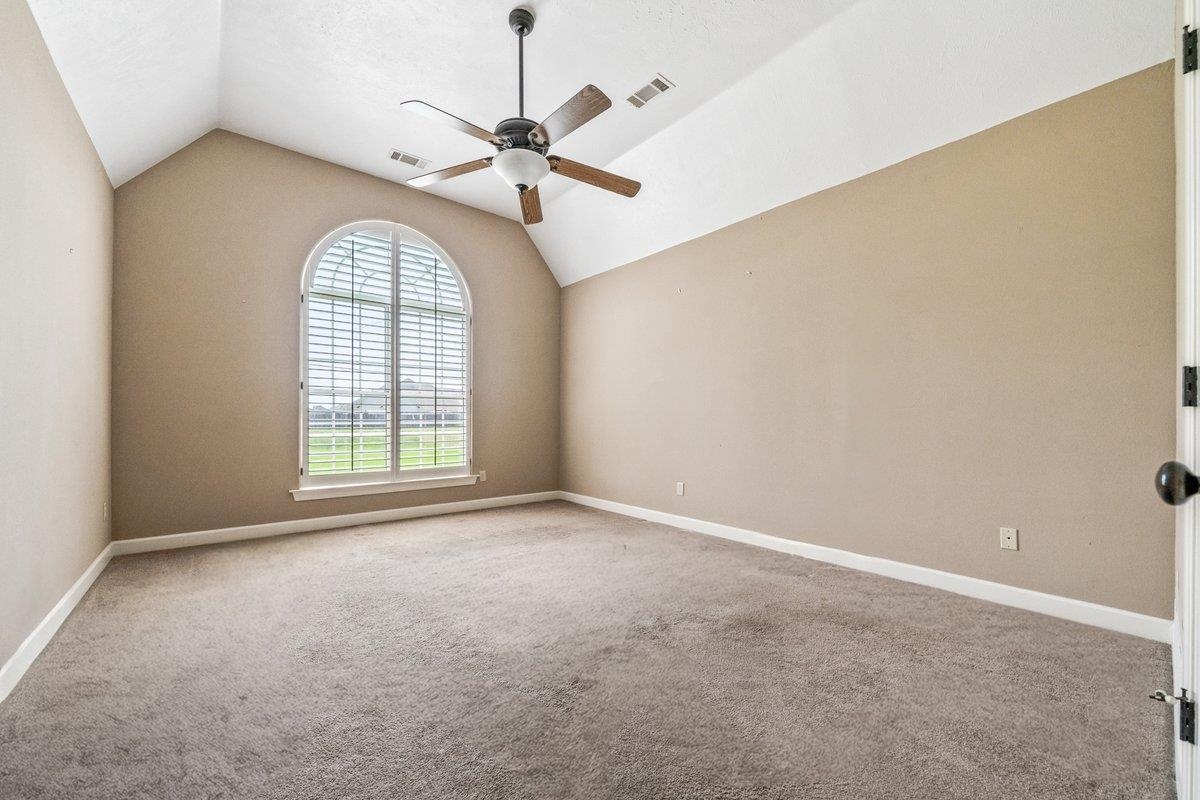 583 Rosemark Road Atoka, TN 38004 - Photo 15 of 25 an empty room with windows and fan