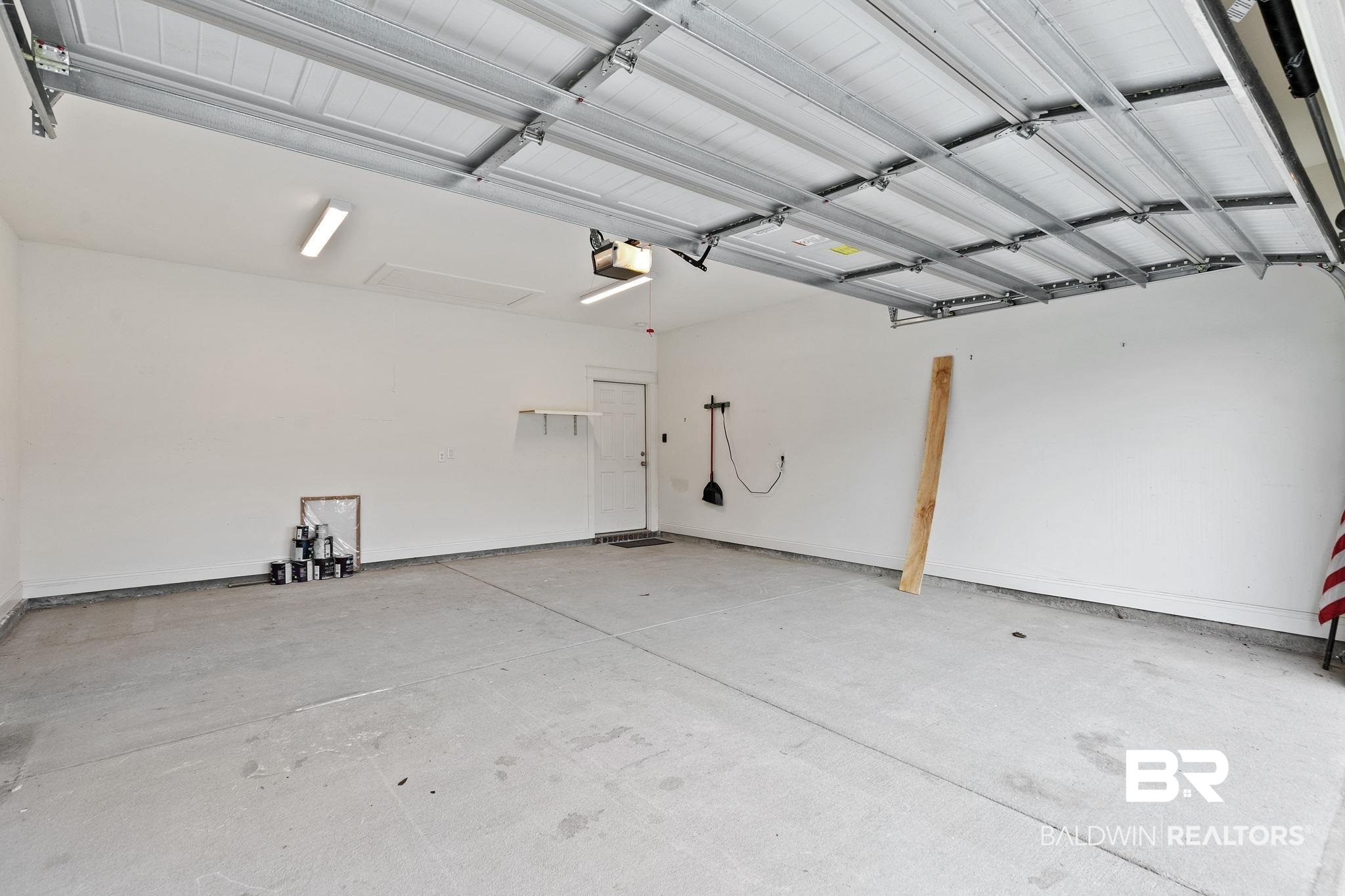 31654 Canopy Loop Daphne, AL 36527 - Photo 46 of 64 Garage with a garage door opener