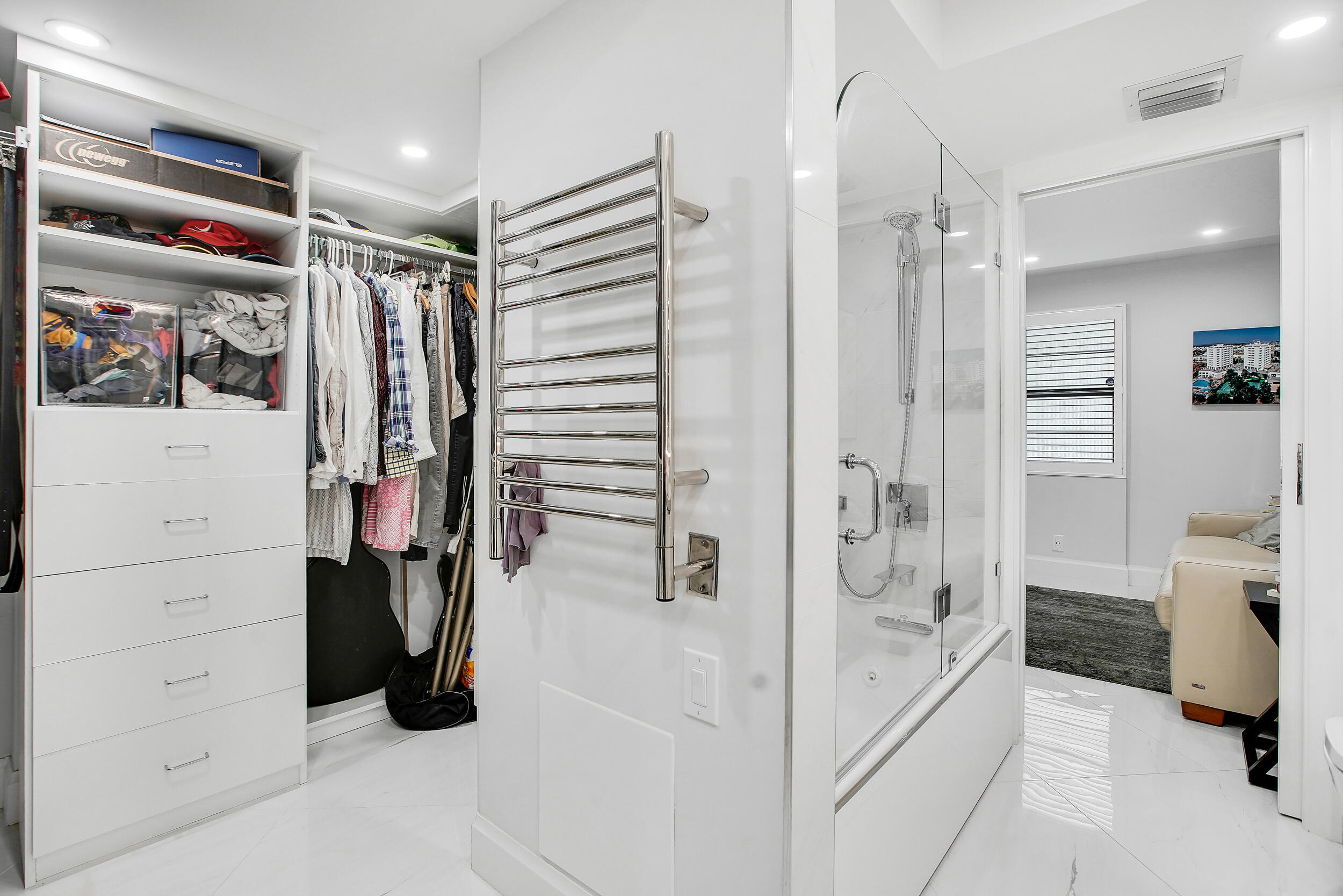 501 Southwest 11th Place, Unit 317 Boca Raton, FL 33432 - Photo 15 of 28 a view of walk in closet and bathroom