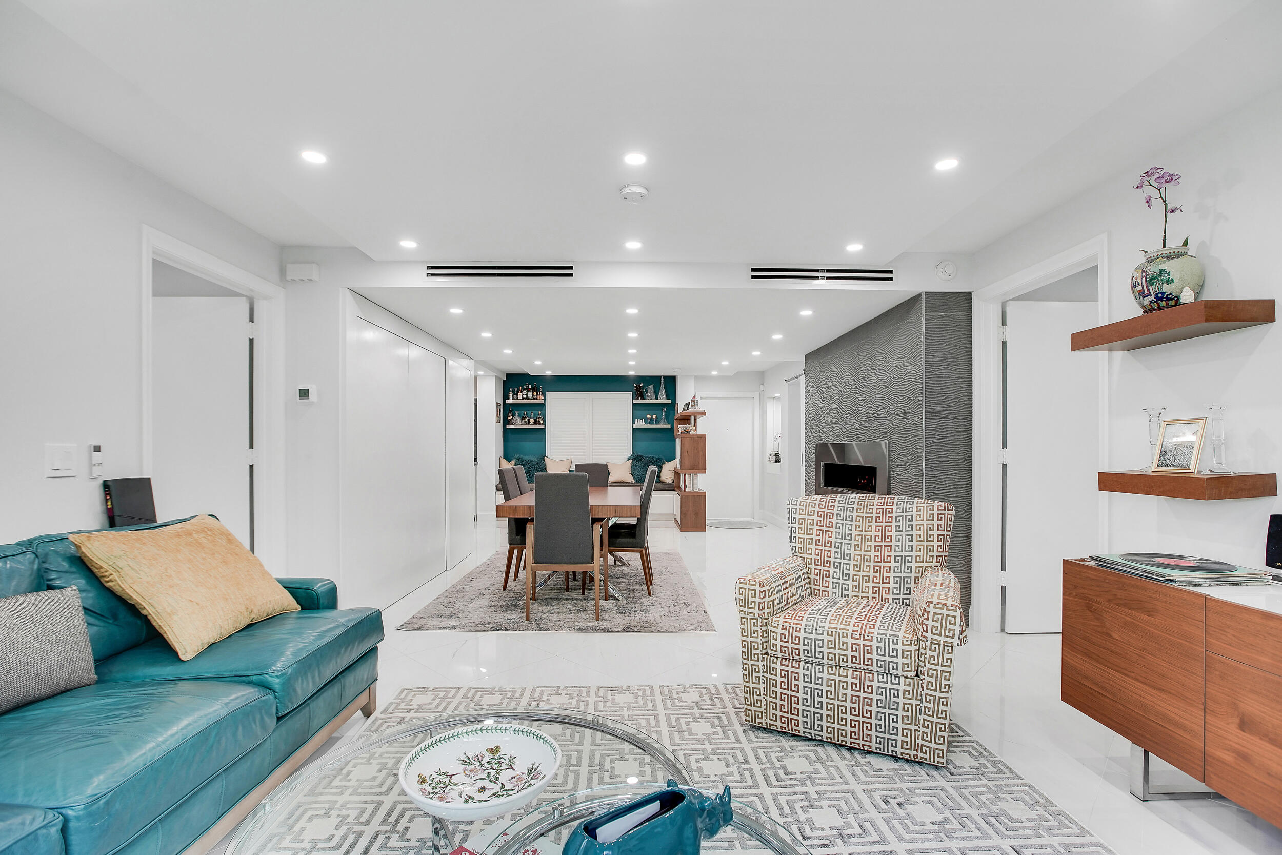 501 Southwest 11th Place, Unit 317 Boca Raton, FL 33432 - Photo 22 of 28 a living room with furniture and a couch
