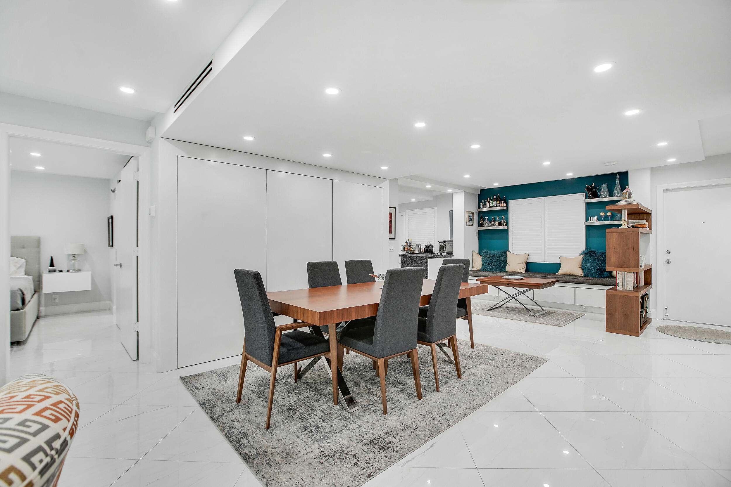 501 Southwest 11th Place, Unit 317 Boca Raton, FL 33432 - Photo 23 of 28 a view of a dining area with furniture