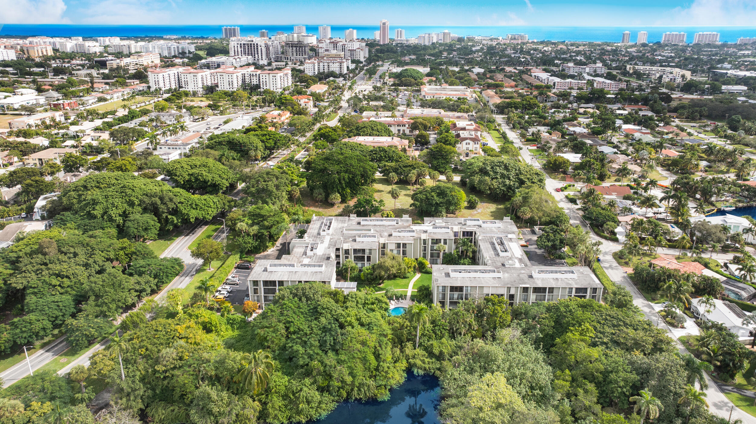 501 Southwest 11th Place, Unit 317 Boca Raton, FL 33432 - Photo 24 of 28 an aerial view of residential houses with city view