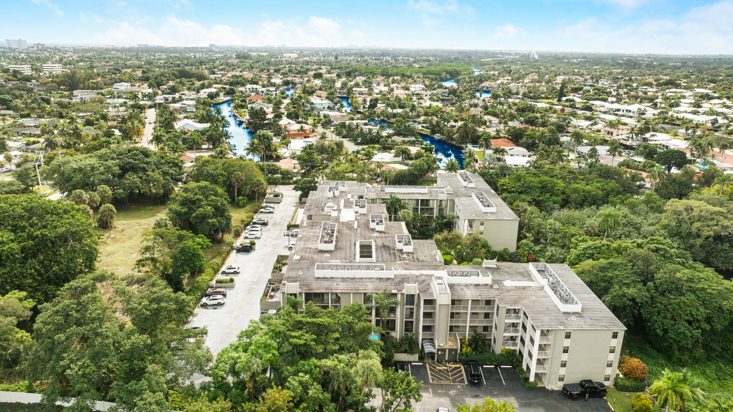 501 Southwest 11th Place, Unit 317 Boca Raton, FL 33432 - Photo 26 of 28 a view of a city with tall buildings