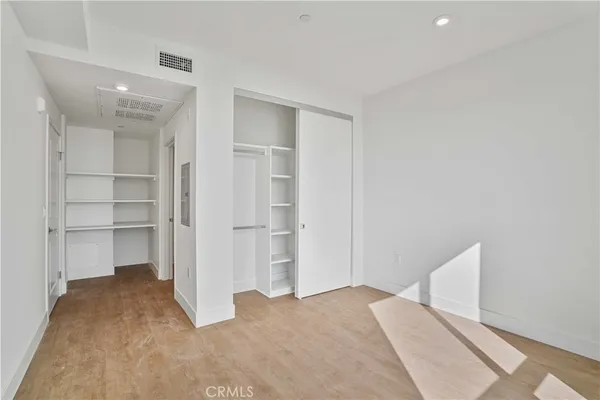 a view of a room with rack on the wall