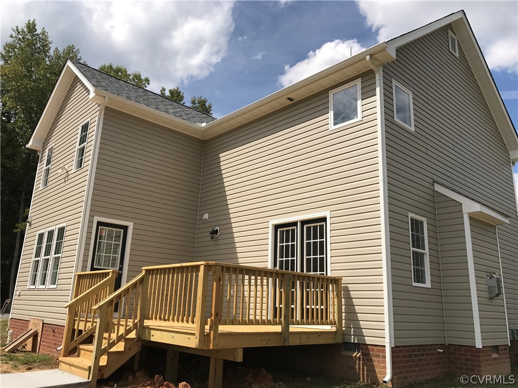 3867 Sage Road Sandy Hook, VA 23153 - Photo 2 of 6 a view of a house with a deck