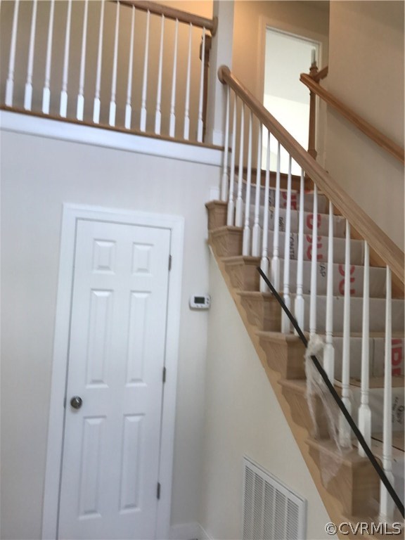 3867 Sage Road Sandy Hook, VA 23153 - Photo 6 of 6 a view of wooden staircase with railing and white walls