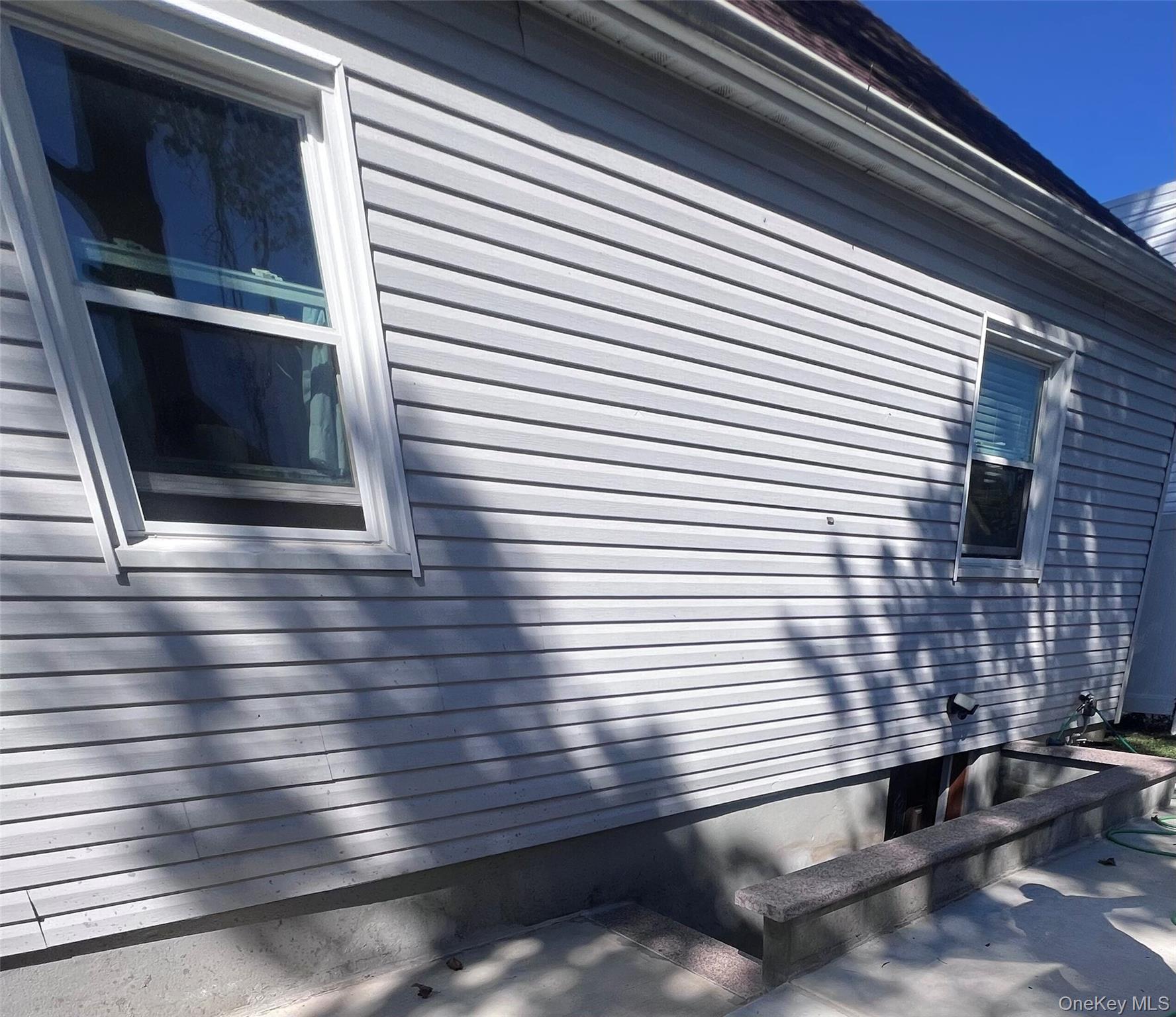 44 Frank Street Valley Stream, NY 11580 - Photo 21 of 23 a view of a house with a door