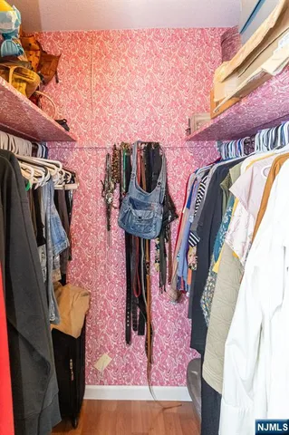 a front view of a house with outdoor seating