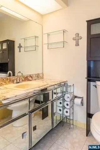 a view of a kitchen with appliances and cabinets