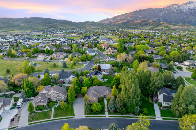 6208 West Bull River Road Highland, UT 84003 - Photo 83 of 90 Expansive residential community featuring a variety of home styles, mature trees, manicured lawns, and paved streets