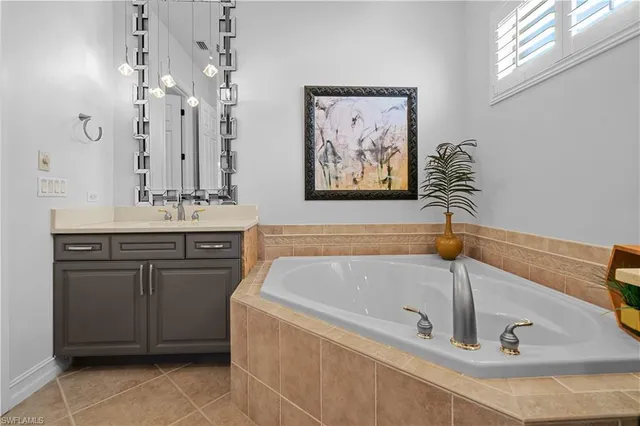 $990,000 | 6977 Bent Grass Drive, Naples, FL 34113