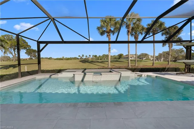 $990,000 | 6977 Bent Grass Drive, Naples, FL 34113