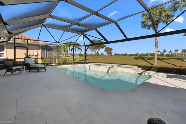 $990,000 | 6977 Bent Grass Drive, Naples, FL 34113