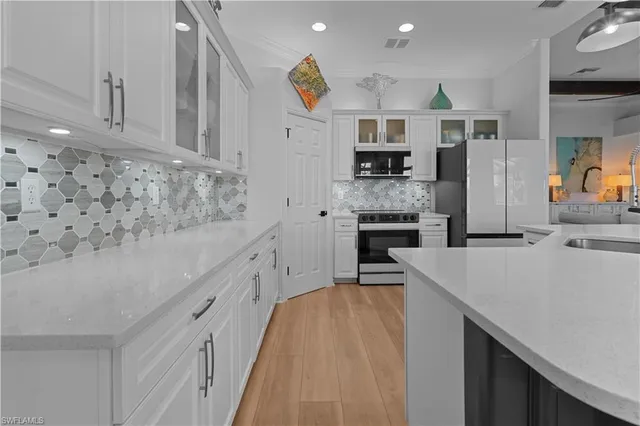 $990,000 | 6977 Bent Grass Drive, Naples, FL 34113