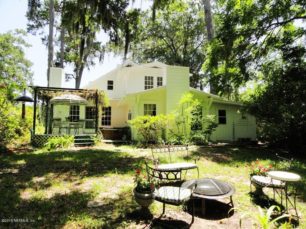 1615 Lorimier Road Jacksonville, FL 32207 - Photo 32 of 53 a view of a chairs and table in backyard