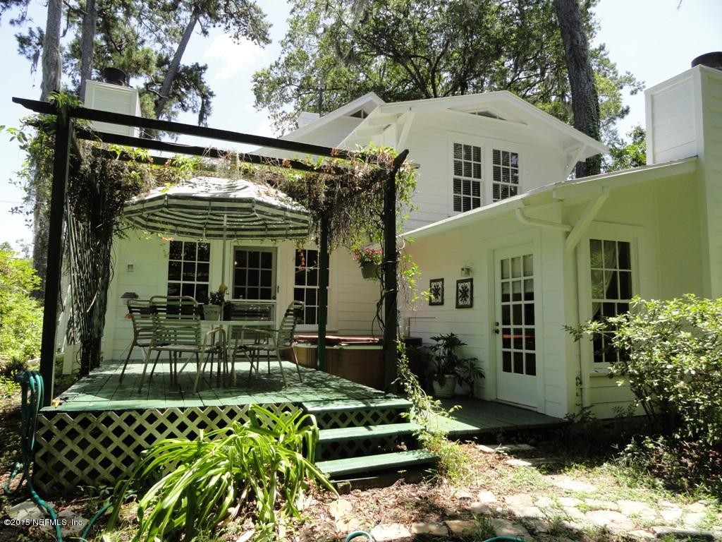1615 Lorimier Road Jacksonville, FL 32207 - Photo 36 of 53 a front view of a house with a garden