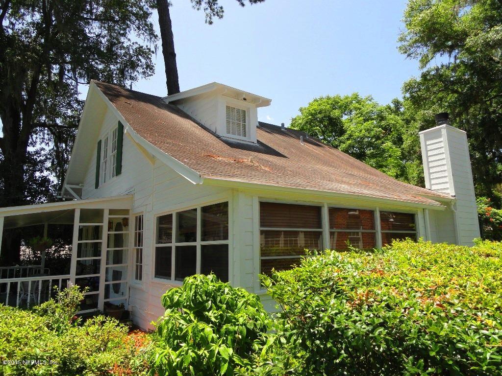 1615 Lorimier Road Jacksonville, FL 32207 - Photo 44 of 53 a front view of a house with a garden