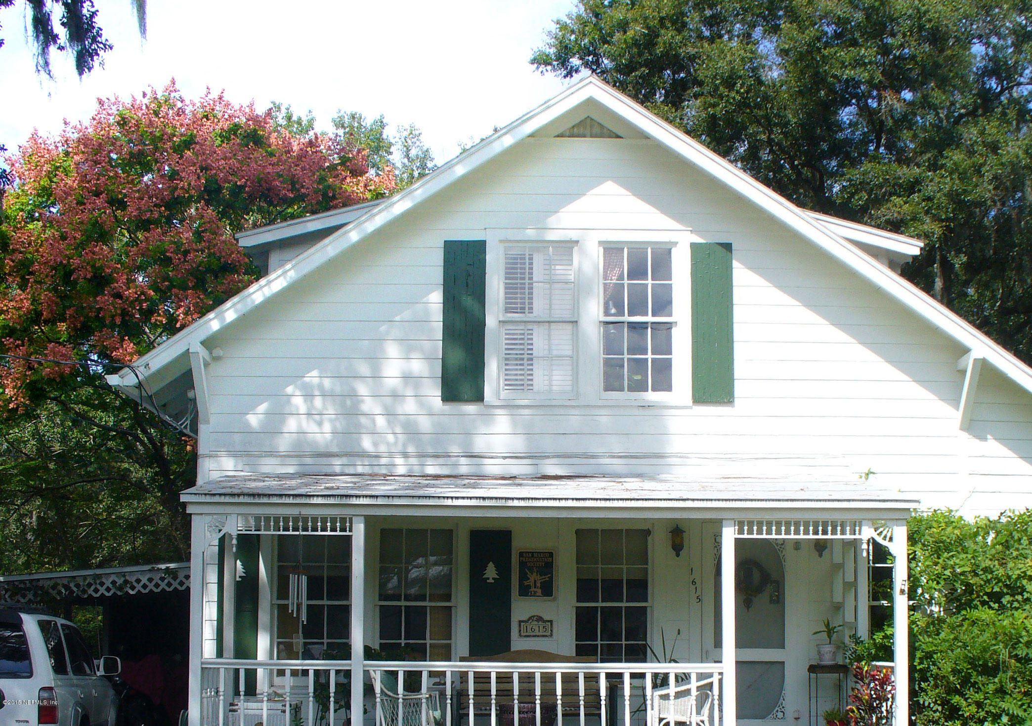1615 Lorimier Road Jacksonville, FL 32207 - Photo 50 of 53 a view of a house with a yard and potted plants