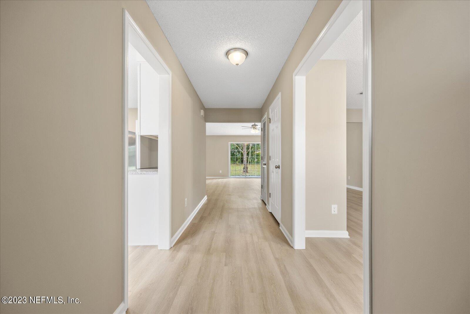1566 Rusty Rail Road Jacksonville, FL 32225 - Photo 3 of 45 a view of a hallway