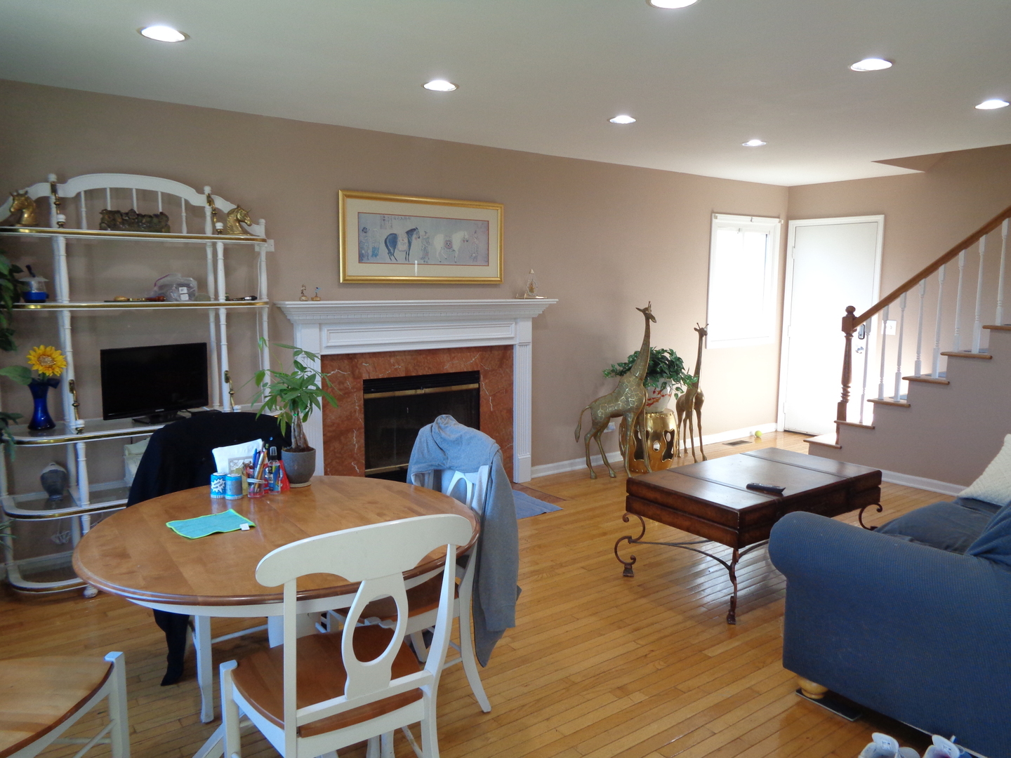 459 Barberry Road Highland Park, IL 60035 - Photo 4 of 11 a dining room with furniture a fireplace and wooden floor