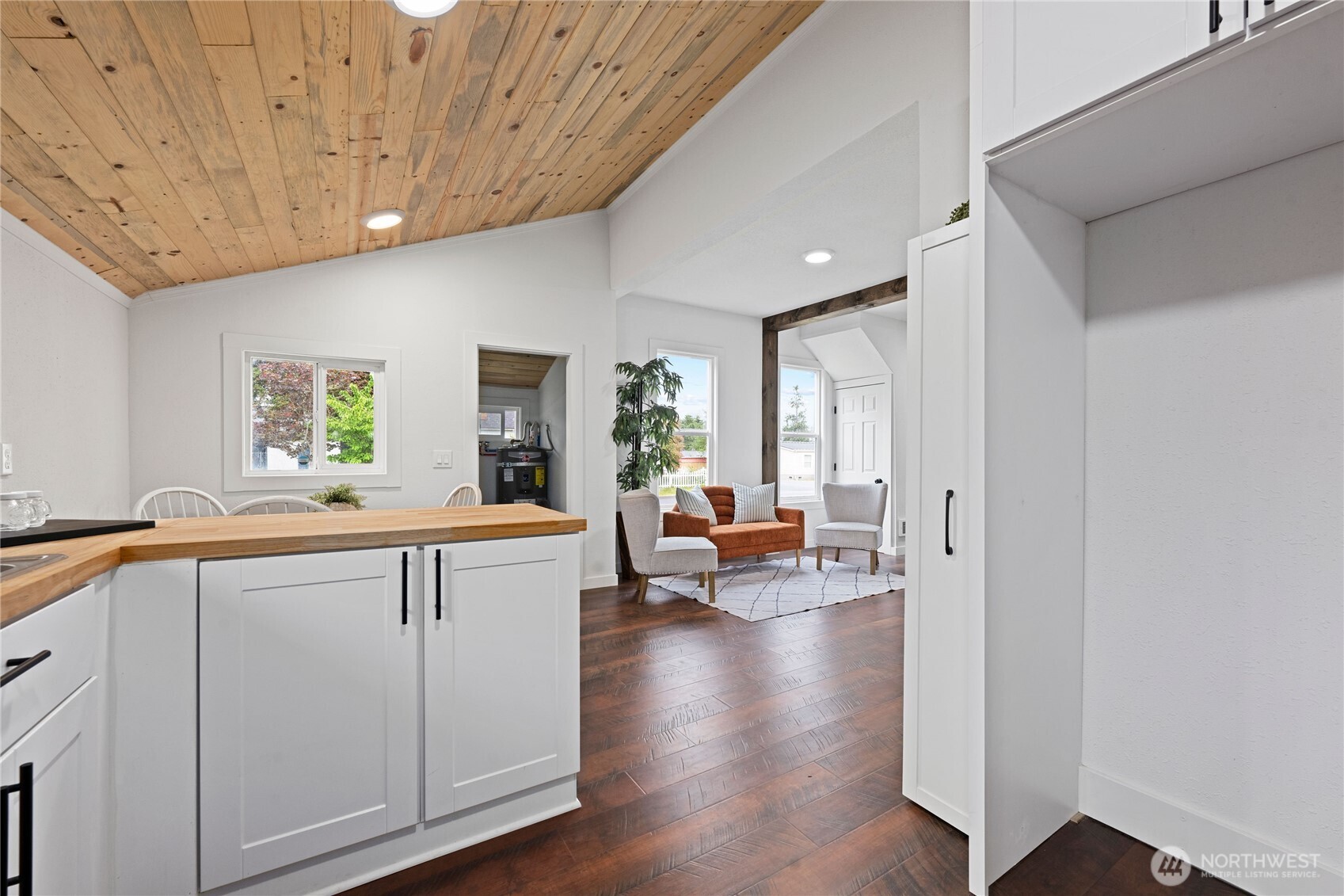 26502 Ridge Avenue Ocean Park, WA 98640 - Photo 17 of 30 a large white kitchen with lots of counter space and furniture