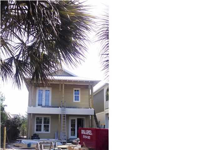 69 Lifeguard Loop East Inlet Beach, FL 32461 - Photo 1 of 26 a front view of a house with garden